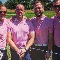 4 football alumni on the pink team at the golf outing